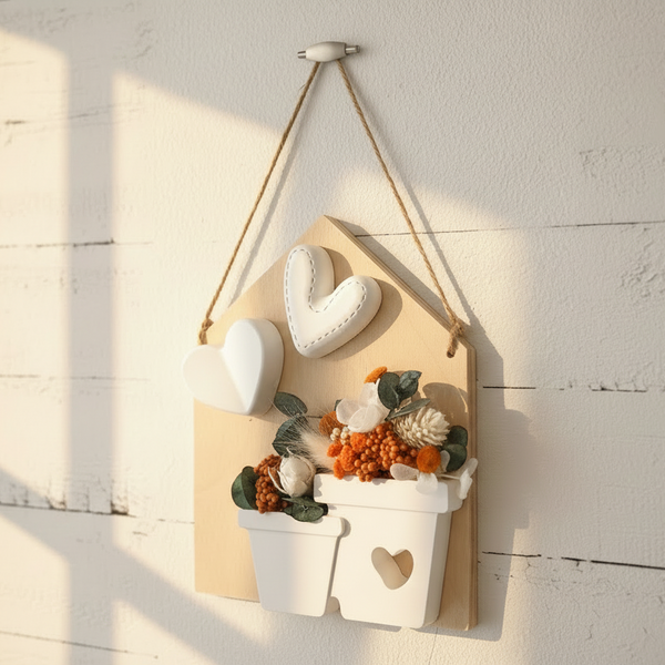 Quadro decorativo com flores secas lilás e vaso cerâmico em madeira estilo minimalista.