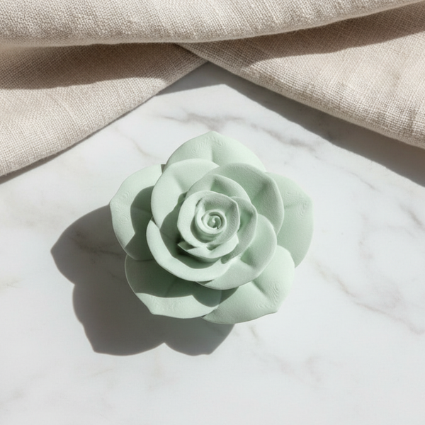 Rosa de cerâmica perfumada artesanal para decorar e perfumar interiores.