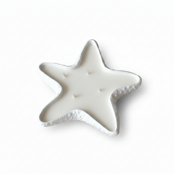 Vela aromática artesanal decorativa feita à mão em estrela do mar de cerâmica.